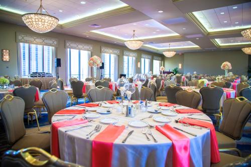 a large banquet room with tables and chairs at DoubleTree by Hilton New Orleans in New Orleans