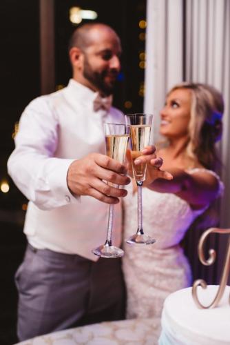 a man and a woman holding champagne glasses at DoubleTree by Hilton New Orleans in New Orleans
