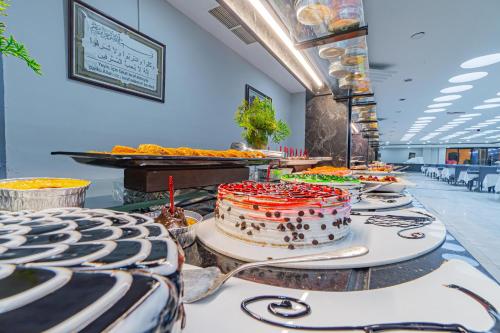 a table with a cake on top of it at May Termal Pamukkale in Pamukkale