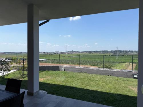 a view of a field from the patio of a house at Gomes Comfort House 2 in Valeggio sul Mincio