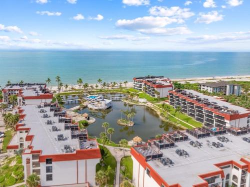 an aerial view of the resort and the ocean at Pointe Santo E4 condo in Sanibel
