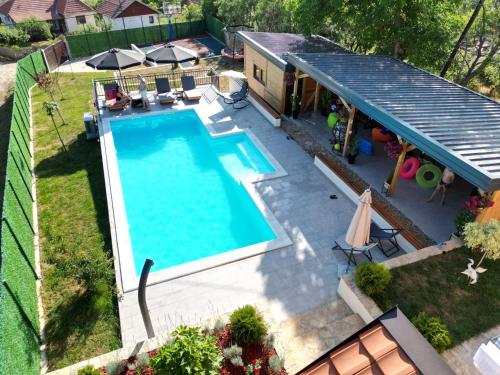 an overhead view of a swimming pool in a backyard at Kosmajko in Koraćica