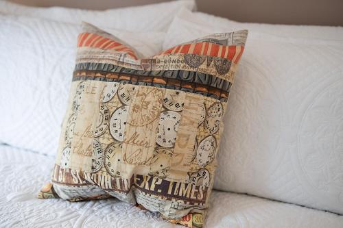 a pillow sitting on top of a bed at Urquhart Terrace Lodge - Grampian Lettings in Aberdeen