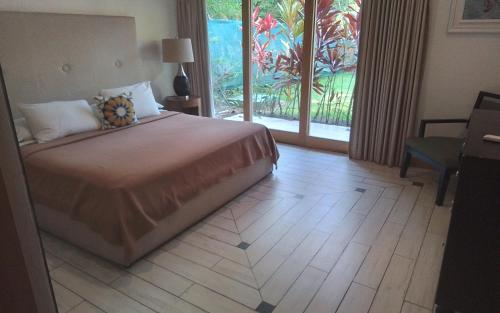 Giường trong phòng chung tại Huis in condominio Río mono