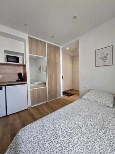 Llit o llits en una habitació de Studio 25