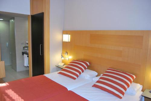 Voodi või voodid majutusasutuse Itaca Jerez by Soho Boutique toas