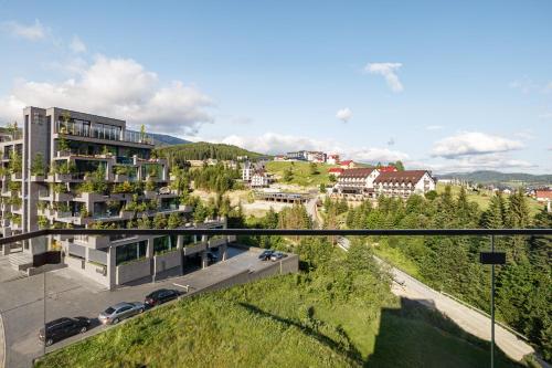arial view of a city with buildings and trees at Tavel Hotel & SPA in Bukovel