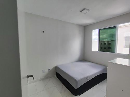 Ένα ή περισσότερα κρεβάτια σε δωμάτιο στο Solar das árvores