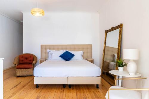 Letto o letti in una camera di Queen's Ocean Sight - Guest House