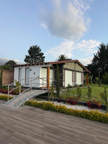 a small house with a staircase leading to it at Quinta Elvira Rose in Checa