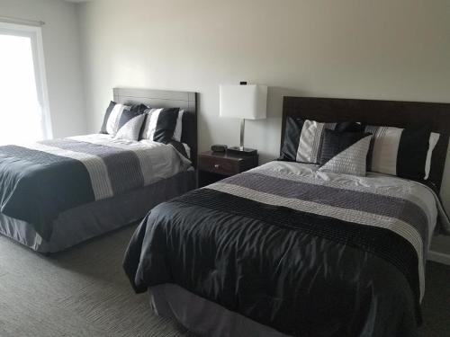 Ένα ή περισσότερα κρεβάτια σε δωμάτιο στο Hotel Manning