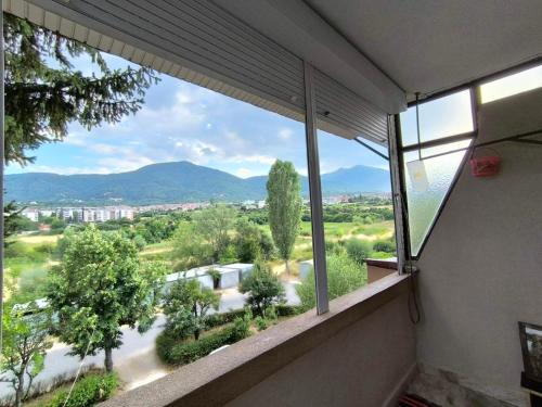 a window in a room with a view of a street at Stan so prekrasen pogled in Bitola