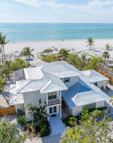 an aerial view of a house on the beach at Waters Edge in Sanibel