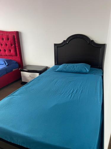 Postel nebo postele na pokoji v ubytování Hostel Titan Plaza Cll 80