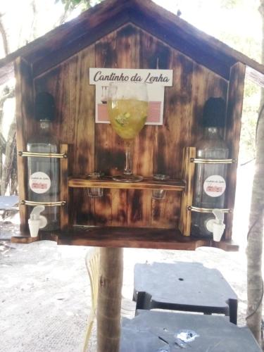 a sign that says cantina ale latrine with a drink at Excelente Casa na Lagoa Guanandy mais acesso a Lagoa Particular in Itapemirim