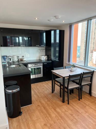 Η κουζίνα ή μικρή κουζίνα στο Perfect-City-Centre Apartments