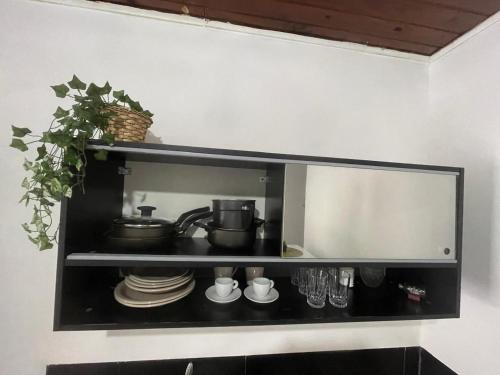 Cuisine ou kitchenette dans l'établissement Casa Privativa com Quarto Confortável e Cozinha Ótima Localização em Foz do Iguaçu