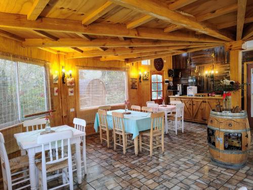 Restoran ili neka druga zalogajnica u objektu Agroturismo mapuweñimen
