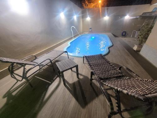 Πισίνα στο ή κοντά στο Linda casa em Araruama com piscina
