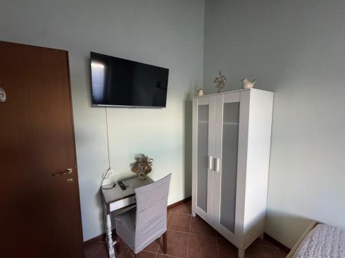 TV a/nebo společenská místnost v ubytování Beb ulivo