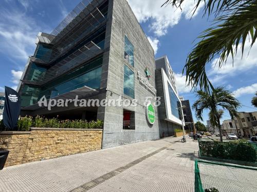 a building with a sign on the side of it at Apartamentos 53 in Barrancabermeja