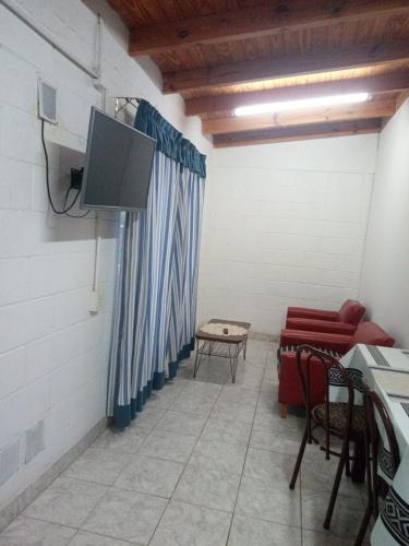 Μια τηλεόραση ή/και κέντρο ψυχαγωγίας στο hospedaje la providencia cabaña