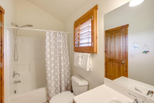 a bathroom with a toilet and a sink and a shower at Grand Elk Golf Club On-Site Mtn-View Home with Deck in Granby