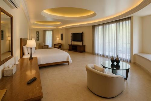 Katil atau katil-katil dalam bilik di South Shore Villa Armonia Luxury Boutique