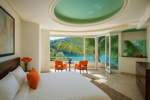 Katil atau katil-katil dalam bilik di South Shore Villa Armonia Luxury Boutique