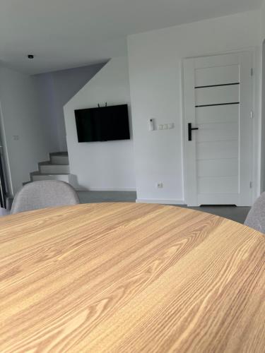 Televisyen dan/atau pusat hiburan di Apartamenty Literówka