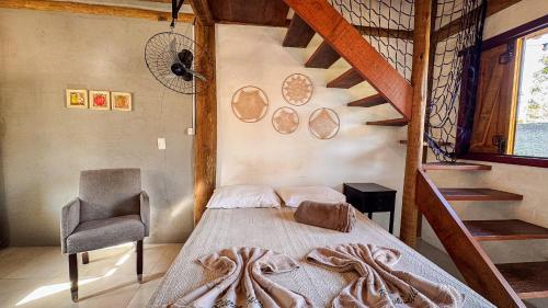 Cama o camas de una habitación en Pousada Reserva Setiba Guarapari