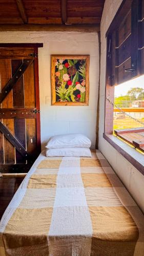 Cama o camas de una habitación en Pousada Reserva Setiba Guarapari