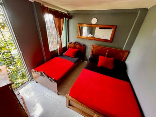 Postel nebo postele na pokoji v ubytování Hotel El Progreso - Económico, Central y Familiar en Armenia