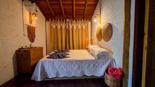 Cama o camas de una habitación en Pousada Reserva Setiba Guarapari