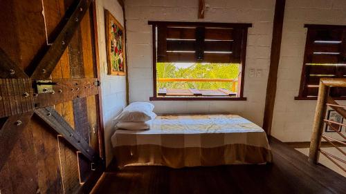 Cama o camas de una habitación en Pousada Reserva Setiba Guarapari