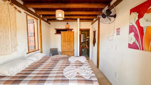 Cama o camas de una habitación en Pousada Reserva Setiba Guarapari