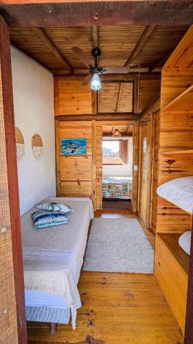 Cama o camas de una habitación en Pousada Reserva Setiba Guarapari