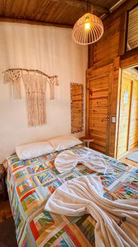 Cama o camas de una habitación en Pousada Reserva Setiba Guarapari