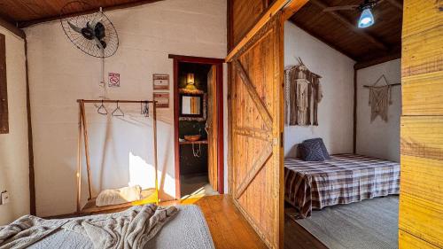 Cama o camas de una habitación en Pousada Reserva Setiba Guarapari
