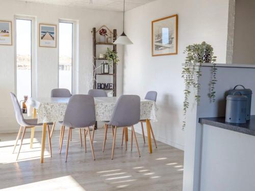 a dining room with a table and chairs at 6 person holiday home in Vestervig in Vestervig