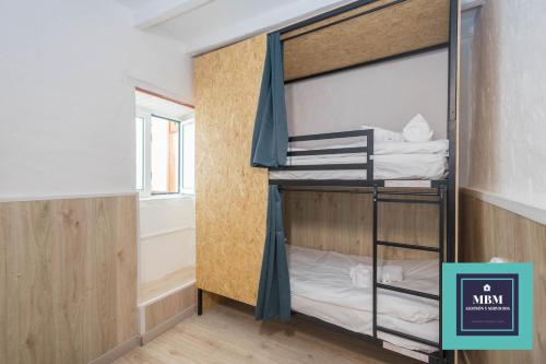 Postel nebo postele na pokoji v ubytování Albergue Casa Jalou
