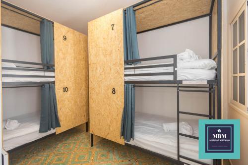 Postel nebo postele na pokoji v ubytování Albergue Casa Jalou