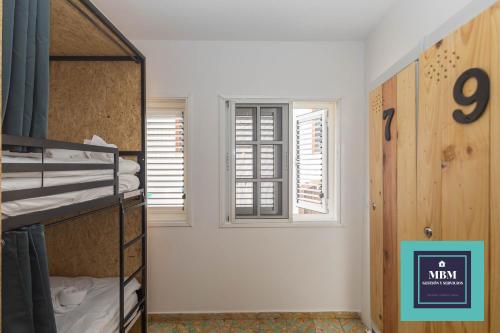 Postel nebo postele na pokoji v ubytování Albergue Casa Jalou
