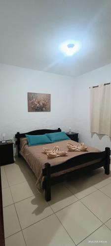 a bedroom with a bed in a room at A pasitos del mar in La Coronilla