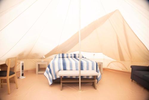 Postel nebo postele na pokoji v ubytování Glamping Majagua