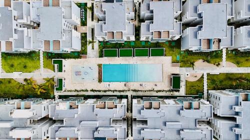 La alberca dentro o cerca de Palm Vibe Condo - Downtown Punta Cana