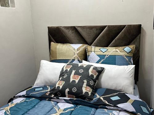 Ένα ή περισσότερα κρεβάτια σε δωμάτιο στο Joburg Triple Nest Retreat