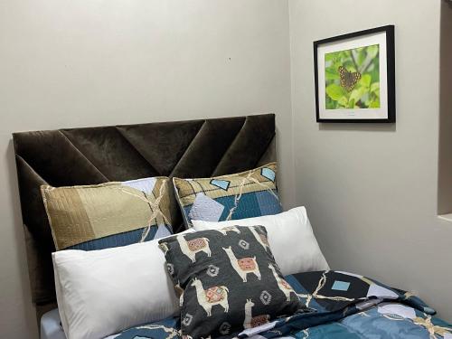 Ένα ή περισσότερα κρεβάτια σε δωμάτιο στο Joburg Triple Nest Retreat