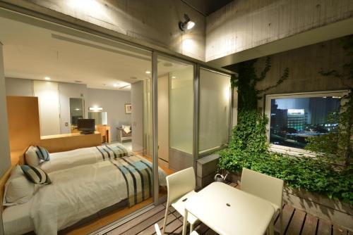 Tempat tidur dalam kamar di Hotel Flex