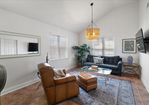 a living room with a couch and a table at Seaside Serenity 3-Bedroom Shore home 2 blocks to the beach and boardwalk in Seaside Heights